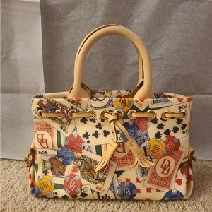 SOLD-Authentic rare Dooney and Bourke casino mini tassle tote